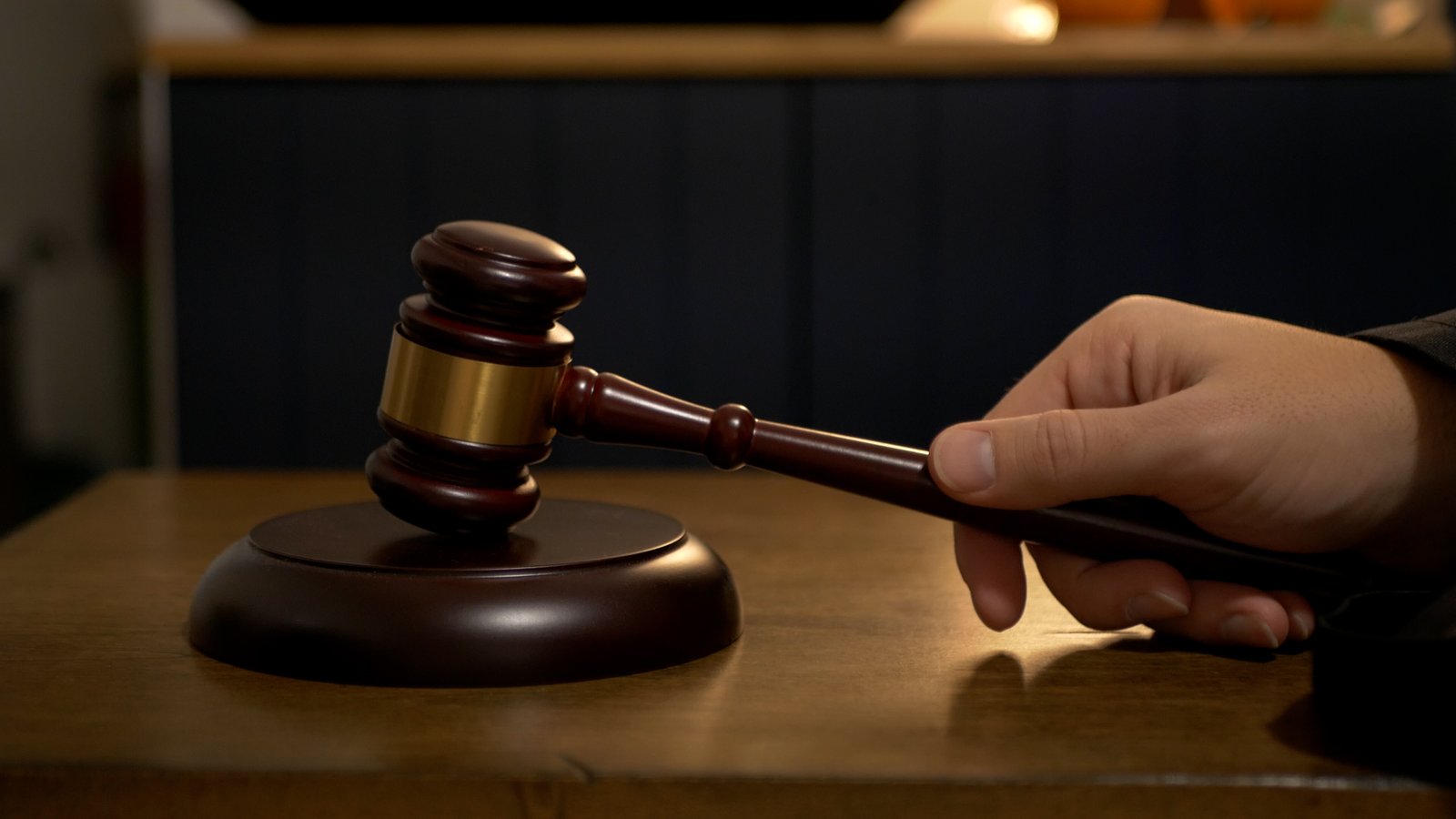 a hand with a gavel
